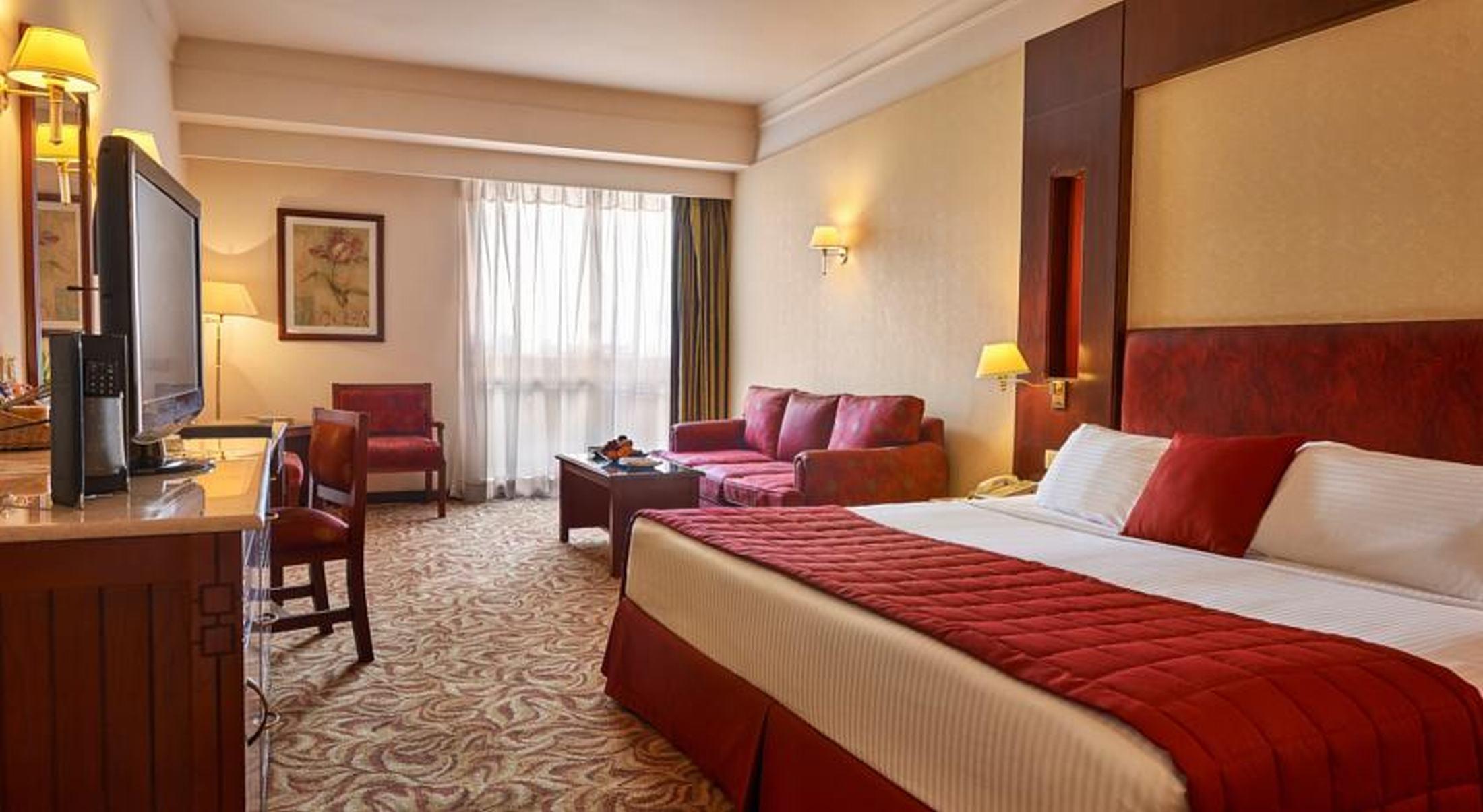 Safir Hotel Cairo Giza Bagian luar foto A room at the Grand Hotel